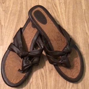 Dark brown flip flops